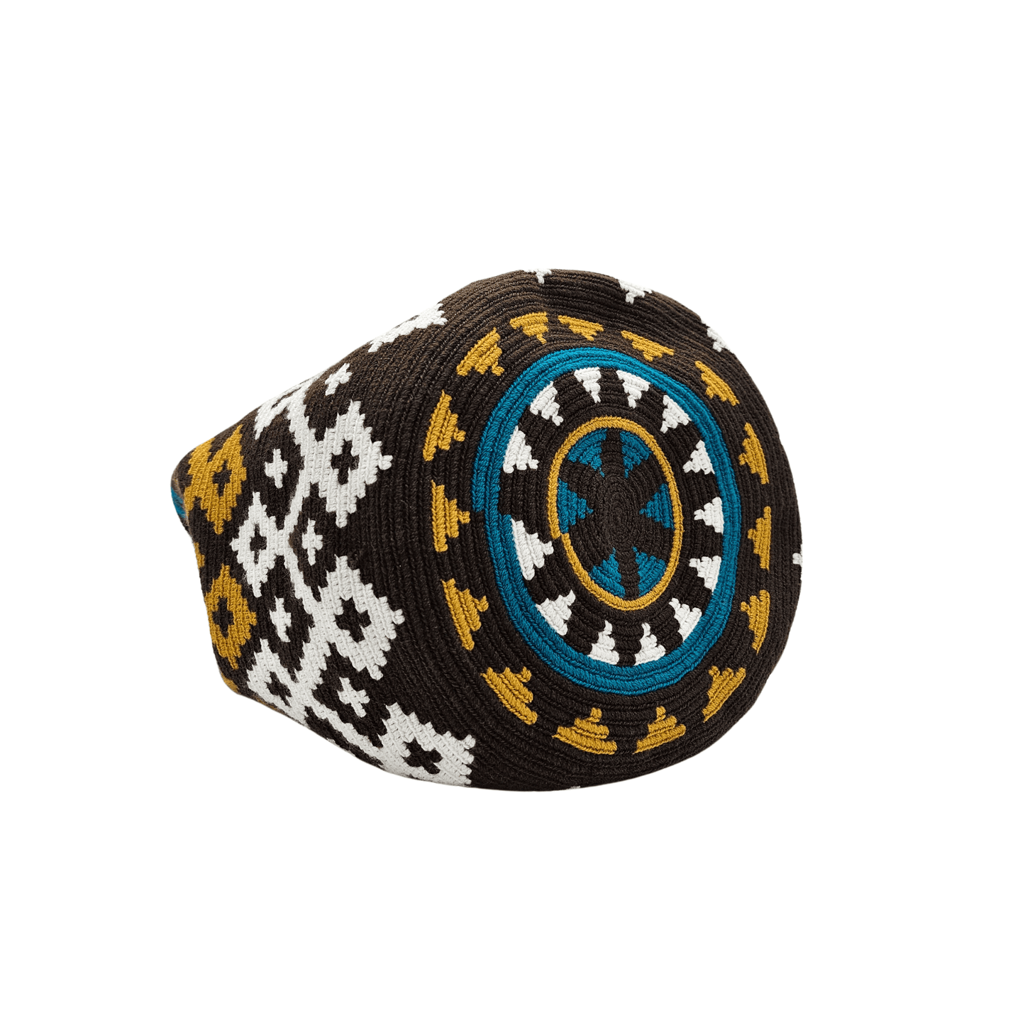 A handmade Wayuu mochila bag with an intricate geometric pattern in black, white, mustard yellow, and teal blue. The cylindrical bag has a woven shoulder strap and a drawstring closure adorned with matching tassels.