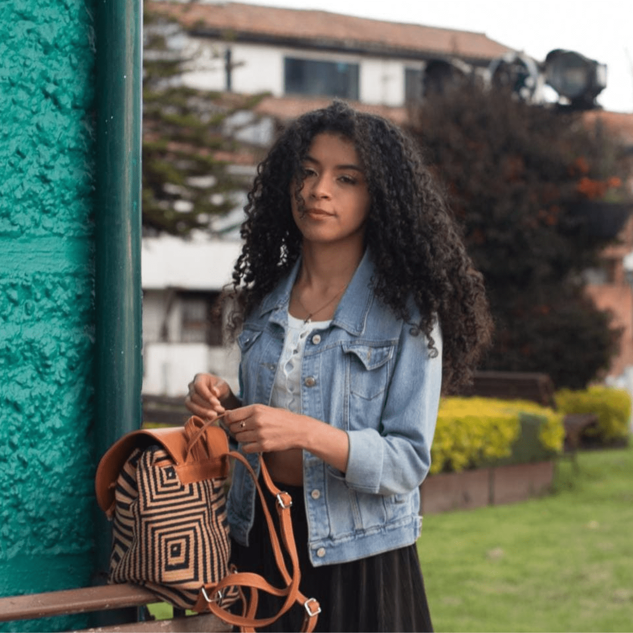 A stylish and durable Minca backpack featuring a unique combination of Wayuu body design and genuine leather accents.