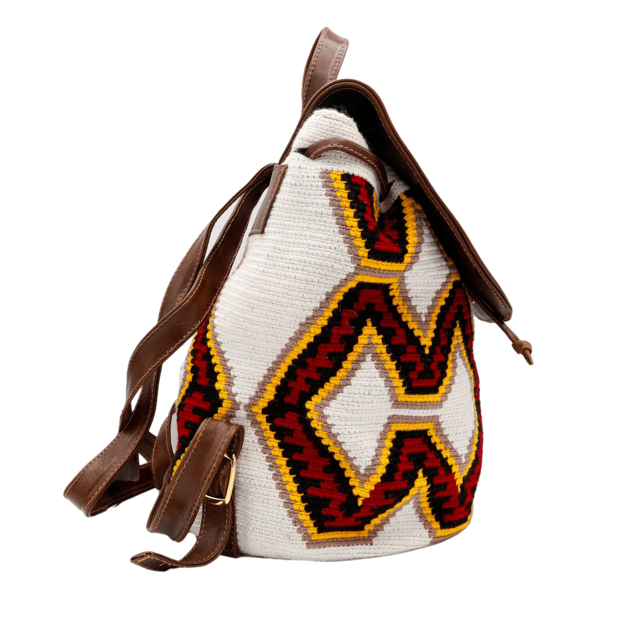 Nini backpack featuring a Wayuu body in a vibrant combination of white, red, yellow, and black, adorned with stylish accents in genuine leather. The backpack showcases a convenient side pocket and a secure double closing mechanism.