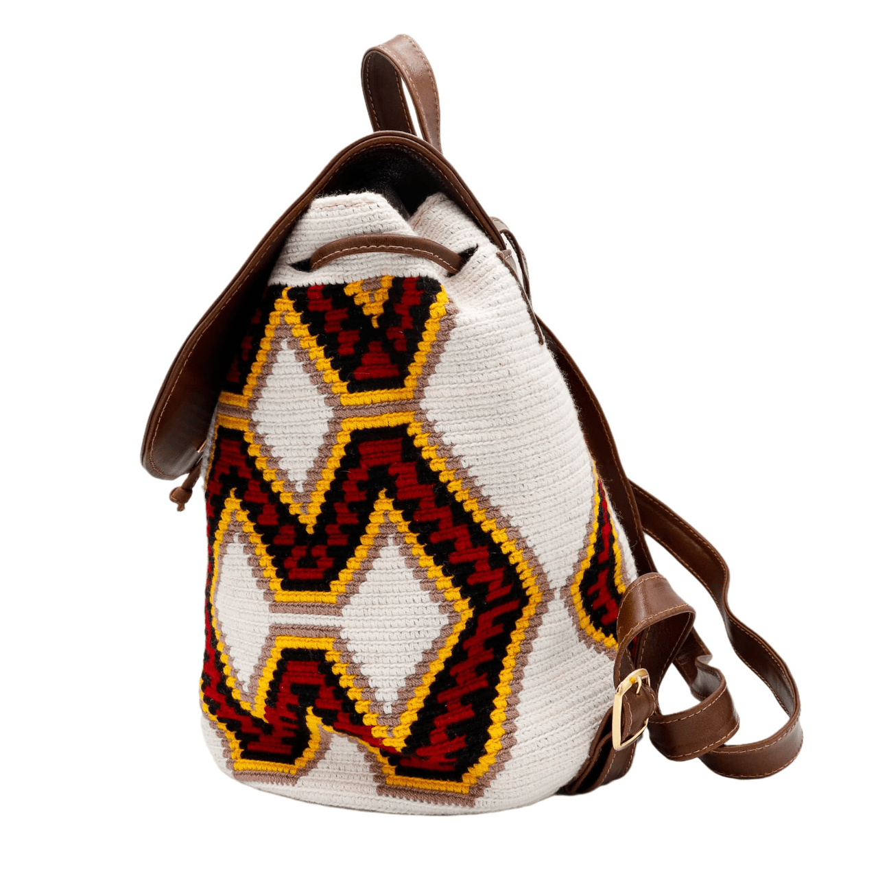 Nini backpack featuring a Wayuu body in a vibrant combination of white, red, yellow, and black, adorned with stylish accents in genuine leather. The backpack showcases a convenient side pocket and a secure double closing mechanism.