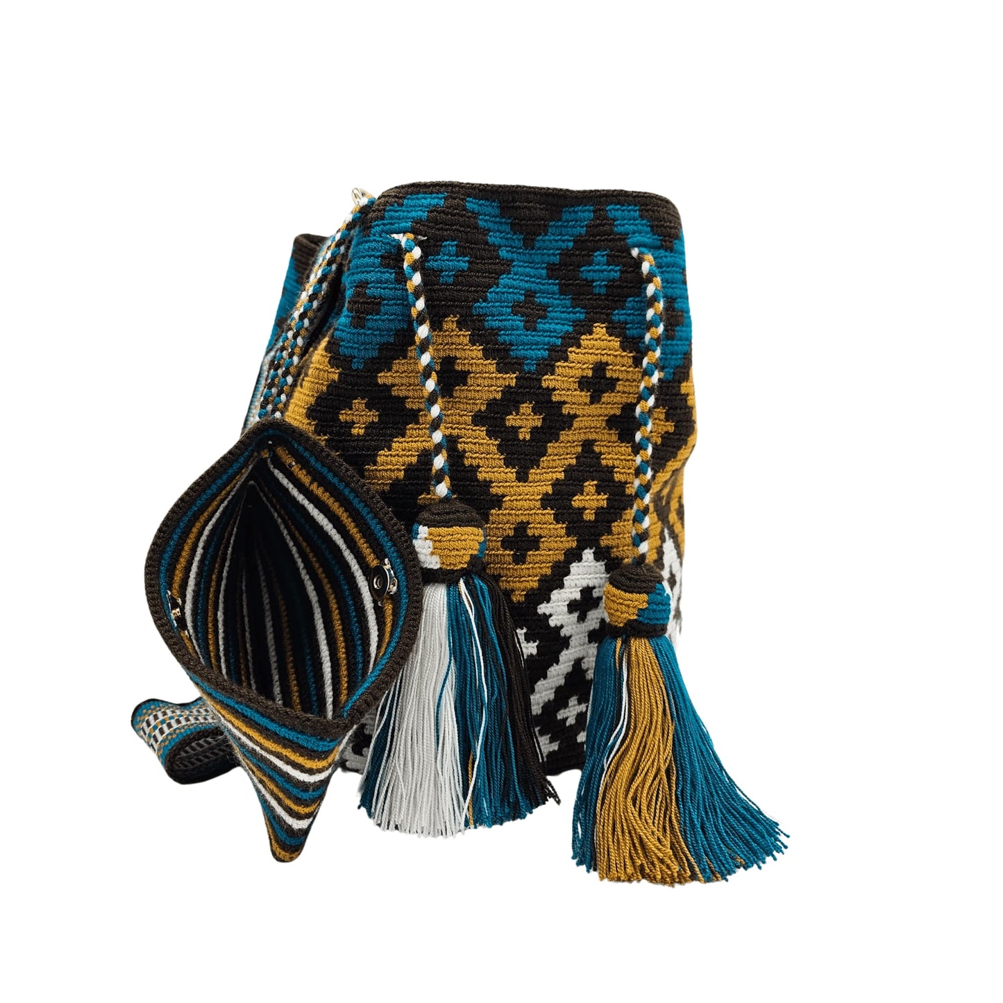 A handmade Wayuu mochila bag with an intricate geometric pattern in black, white, mustard yellow, and teal blue. The cylindrical bag has a woven shoulder strap and a drawstring closure adorned with matching tassels.