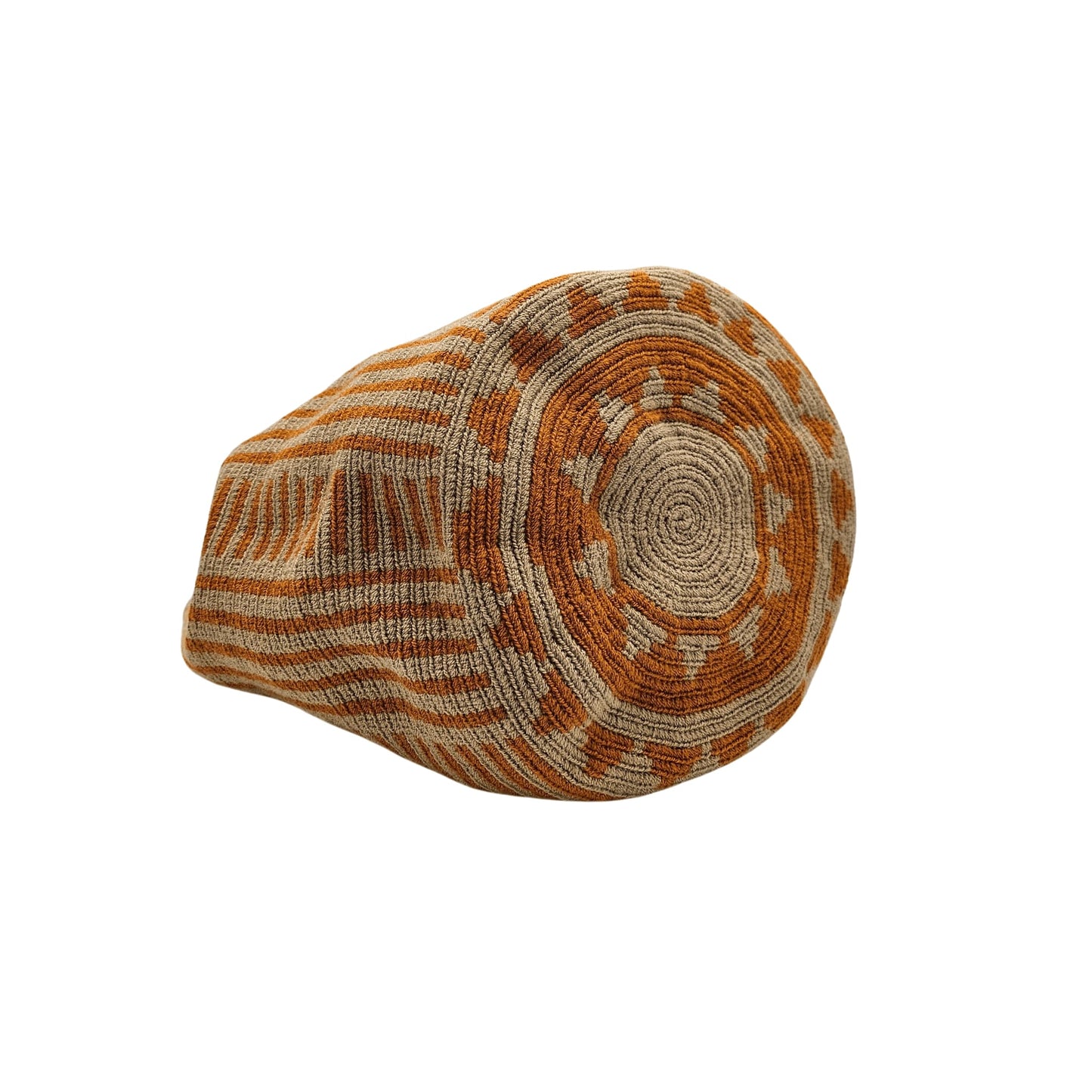 A Wayuu bag with a rusty orange background and a woven geometric pattern in beige. The bag has a drawstring closure with long tassels.