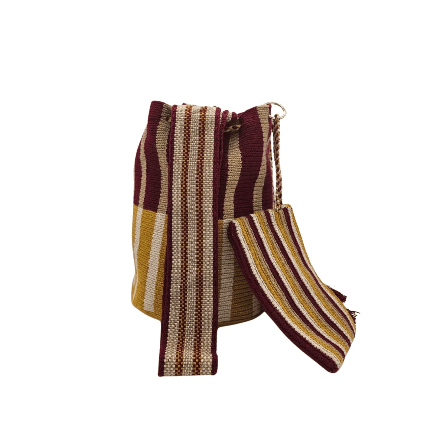 A handmade Wayuu bag in earthy tones of brown, beige, and rust, showcasing intricate weaving patterns and vibrant accents, representing authentic Colombian craftsmanship.
