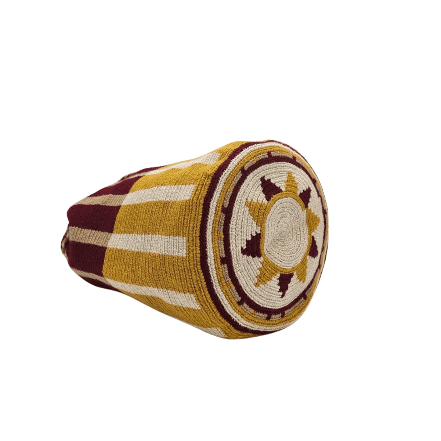 A handmade Wayuu bag in earthy tones of brown, beige, and rust, showcasing intricate weaving patterns and vibrant accents, representing authentic Colombian craftsmanship.