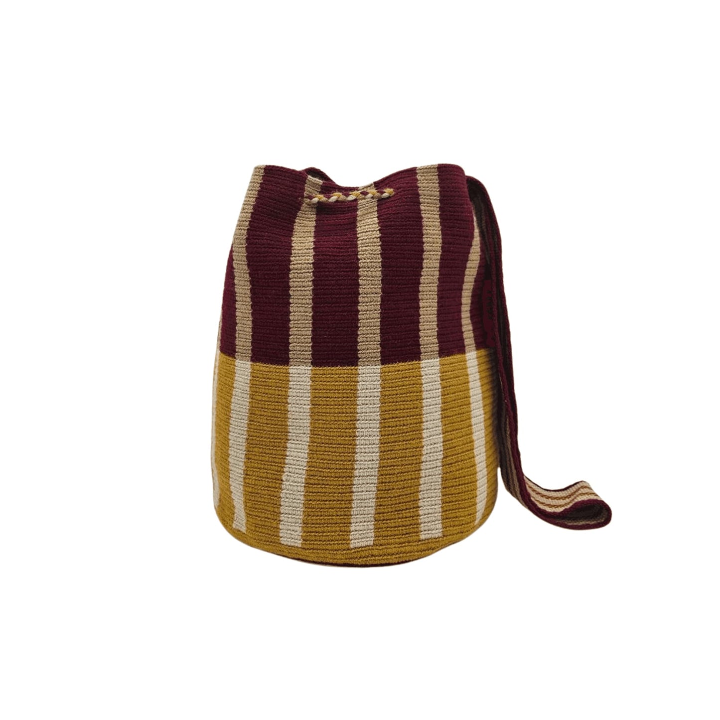 A handmade Wayuu bag in earthy tones of brown, beige, and rust, showcasing intricate weaving patterns and vibrant accents, representing authentic Colombian craftsmanship.