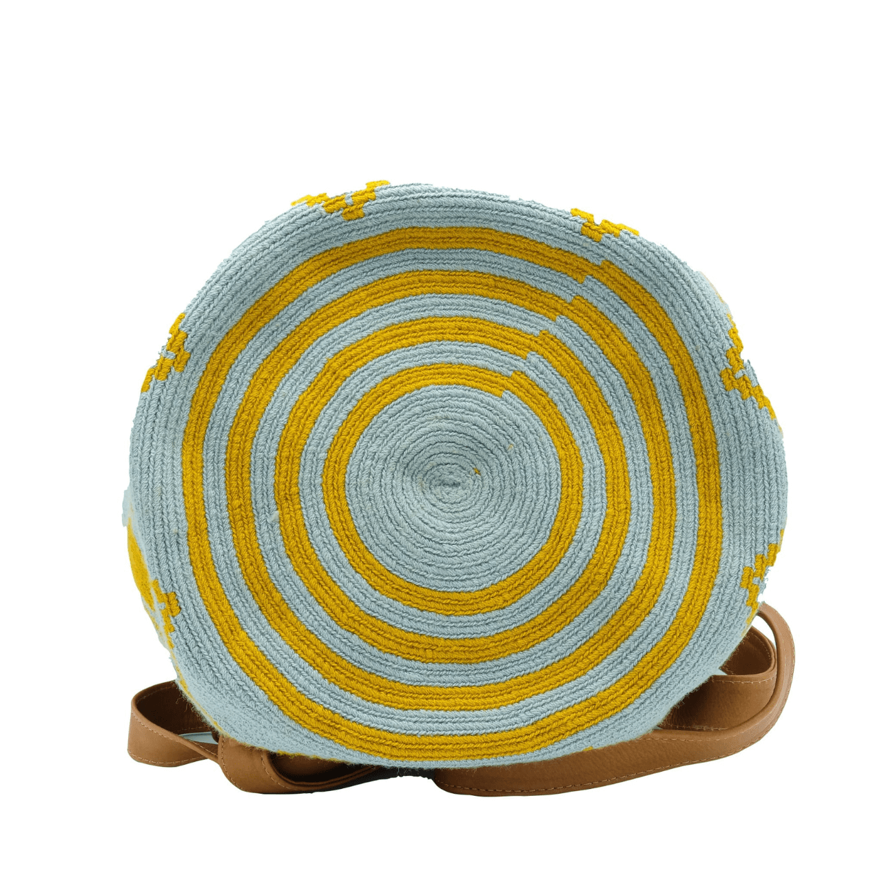 Taganga leather backpack featuring a stunning Wayuu pattern in a captivating blend of blue-gray and ochre colors. The design is accentuated with natural genuine leather, creating a beautiful contrast. This versatile bag is perfect for day outings or short trips, offering a lightweight and comfortable carrying experience.