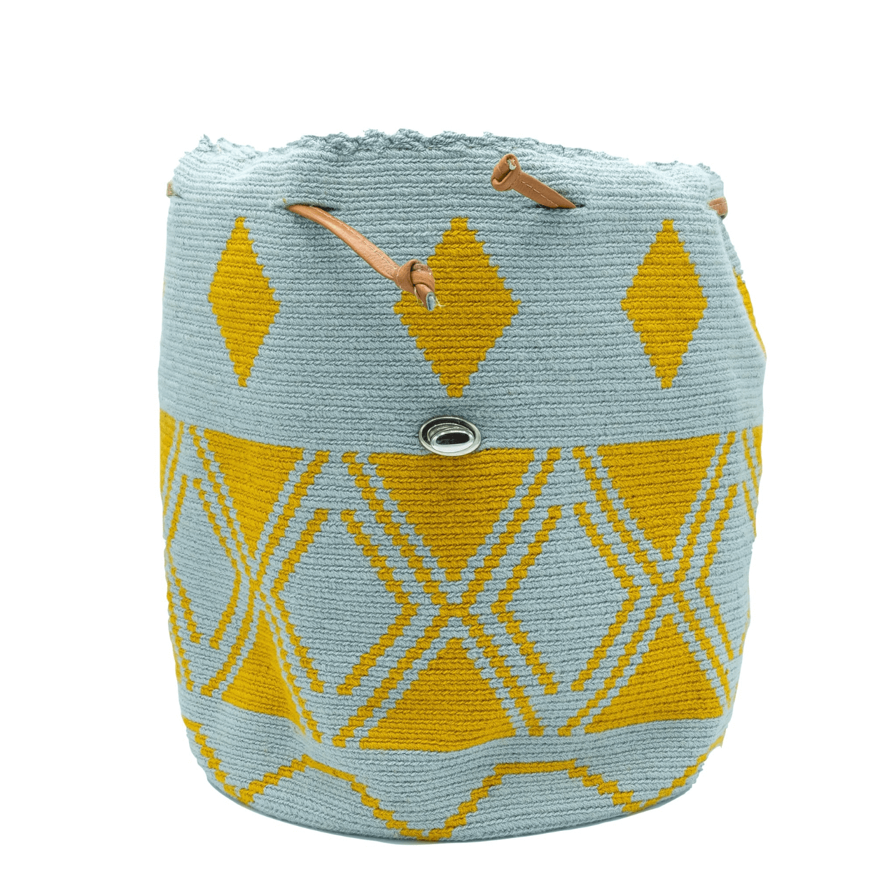 Taganga leather backpack featuring a stunning Wayuu pattern in a captivating blend of blue-gray and ochre colors. The design is accentuated with natural genuine leather, creating a beautiful contrast. This versatile bag is perfect for day outings or short trips, offering a lightweight and comfortable carrying experience.