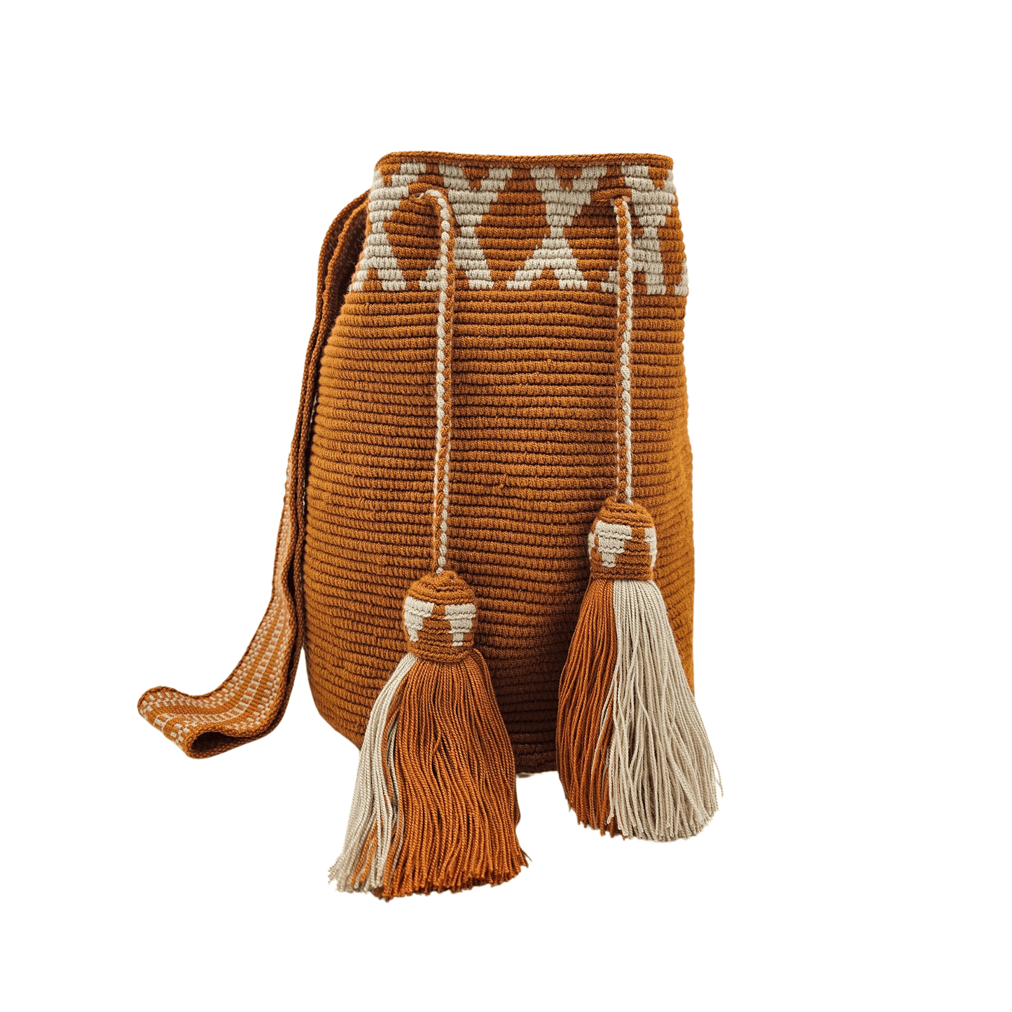 Handwoven Wayuu bag in a rich terracotta hue with intricate beige geometric patterns along the top. Featuring a braided shoulder strap and two decorative tassels, this Colombian handmade bag is crafted using traditional Wayuu crochet techniques.