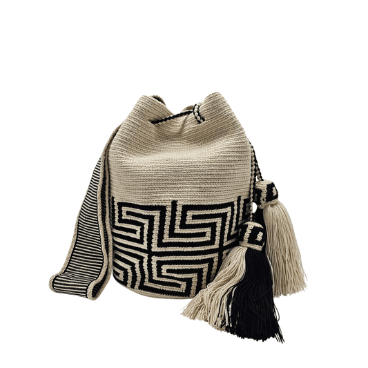 Handmade Wayuu bag by Wayuu artisans, this unique bag in beige and black tones with a pre-Columbian geometric design is perfect for everyday use.