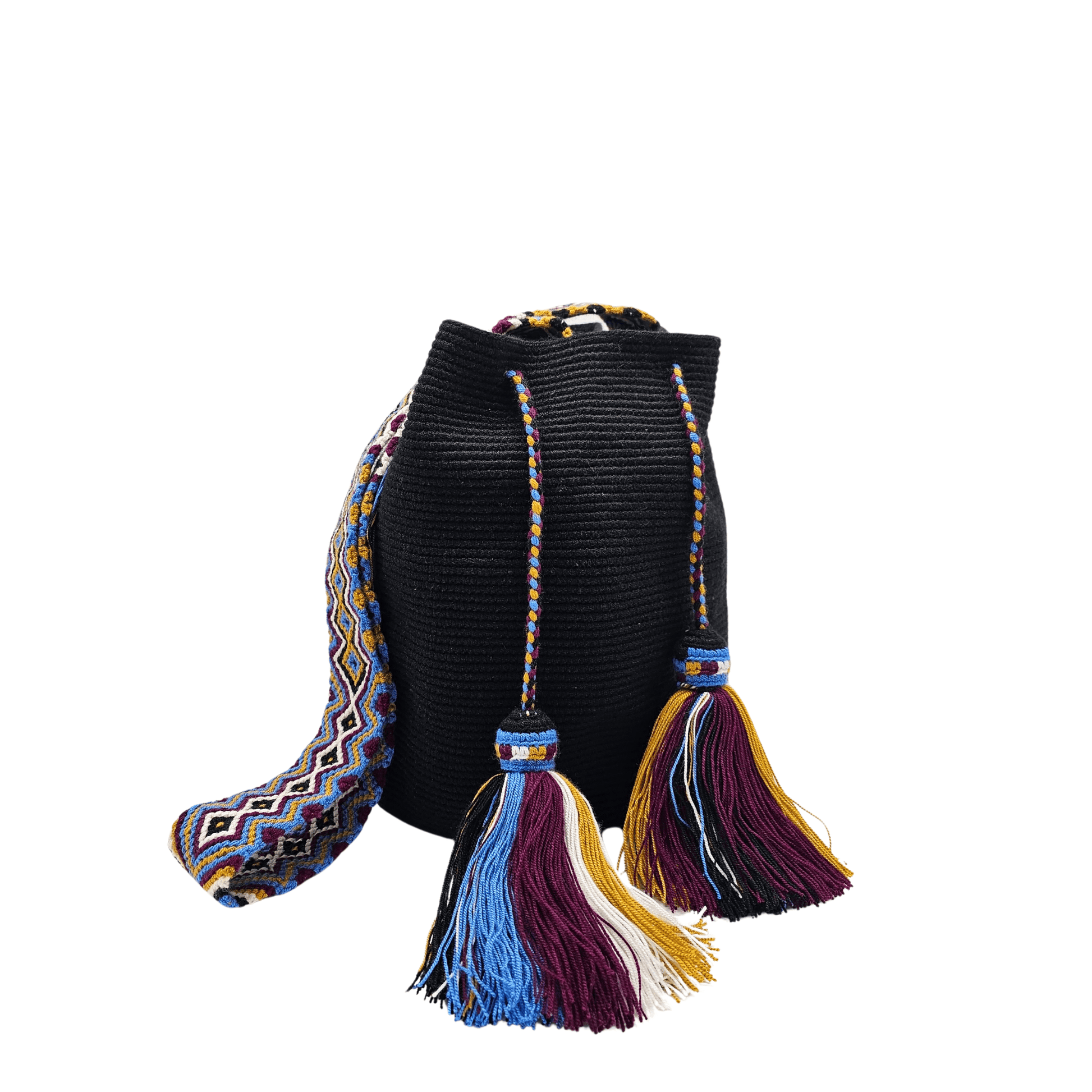 Solid black Wayuu bag with colorful macrame strap, perfect for everyday use by Origin Colombia.