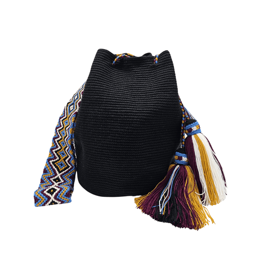 Solid black Wayuu bag with colorful macrame strap, perfect for everyday use by Origin Colombia.