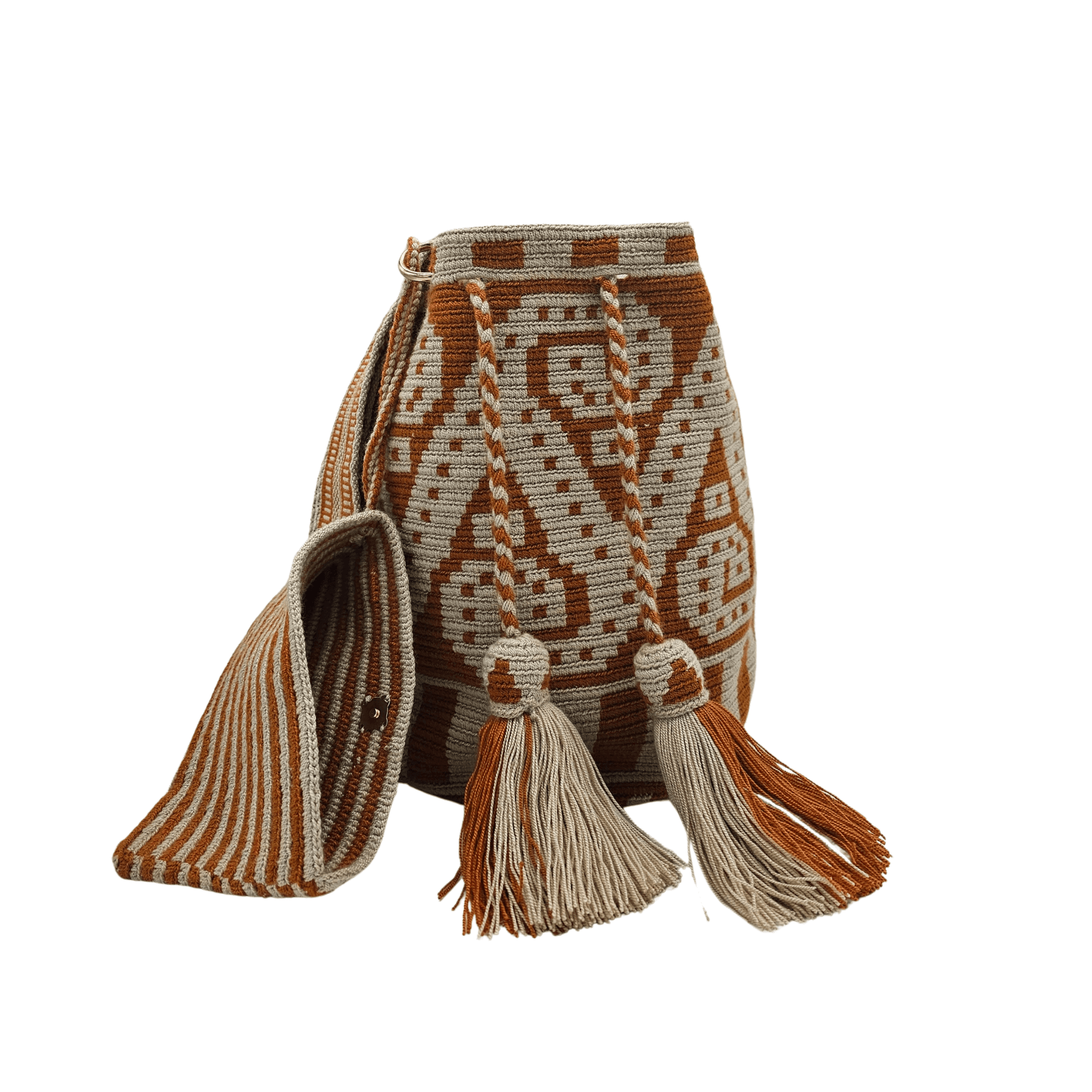 A Wayuu bag with a brown background and intricate woven patterns in a lighter beige color. The bag has a drawstring closure with long tassels.