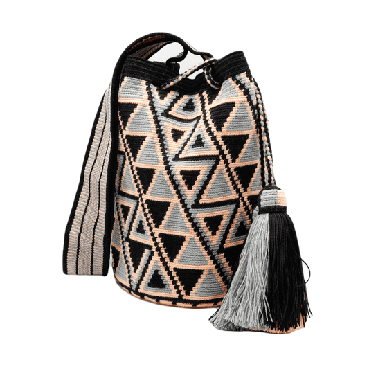 Stunning Wayuu bag in black, pink, and gray with intricate pattern, perfect for crossbody wear.