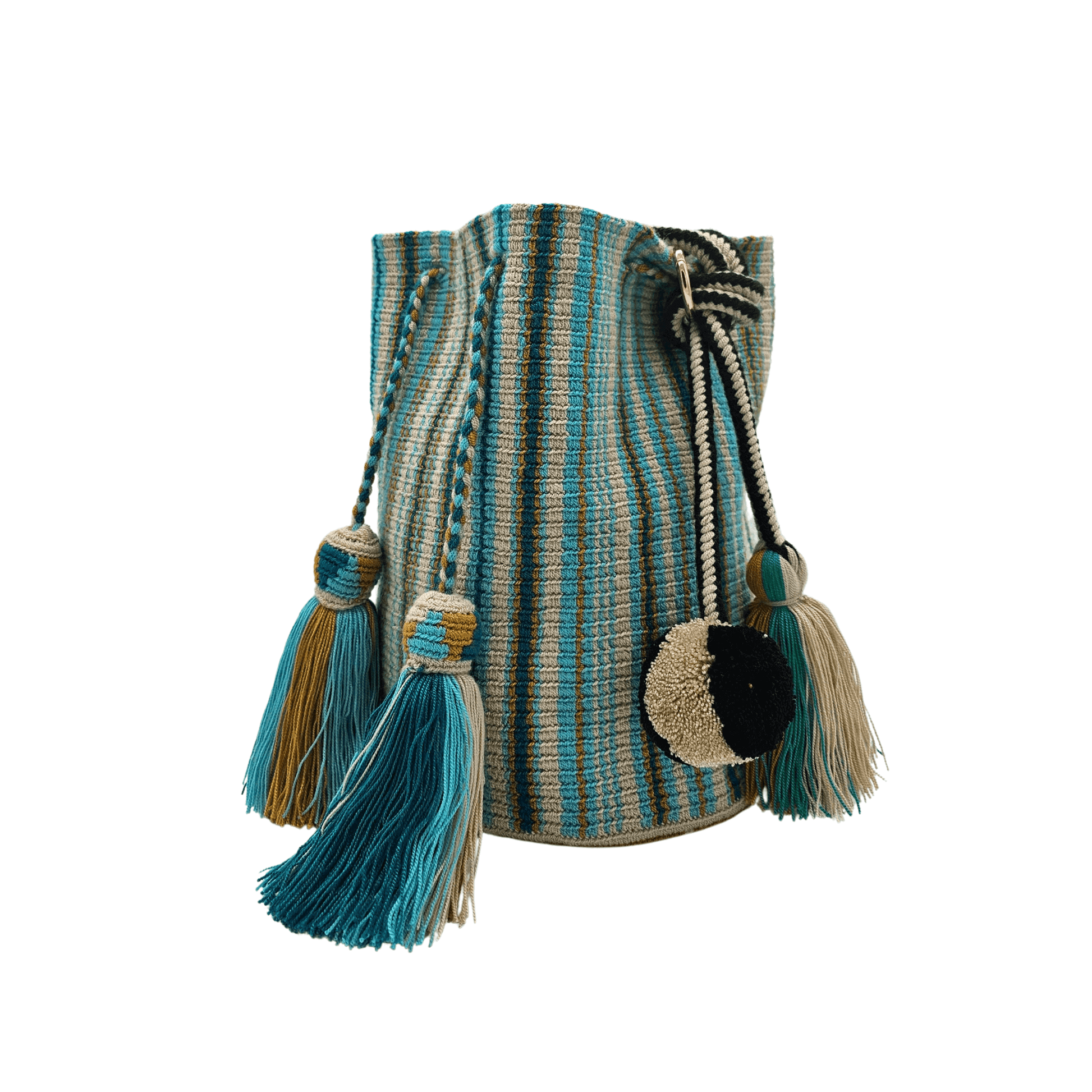 A handcrafted Wayuu bag with a vibrant striped pattern in turquoise, white, and yellow. The bag features a single long, braided black-and-white shoulder strap, a drawstring closure, and decorative tassels with a black pompoms accent.