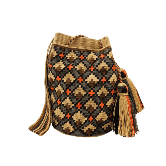 A beige Wayuu Mochila bag with a geometric pattern in brown and orange. It has a drawstring closure with tassels.