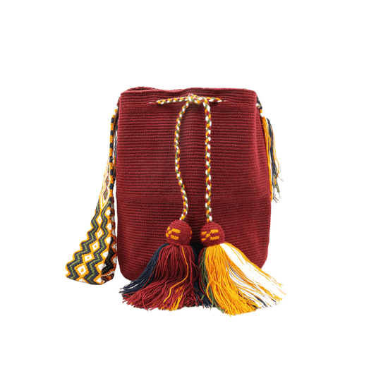 Lily Wayuu bag in solid burgundy with a macrame strap, handmade in Colombia.
