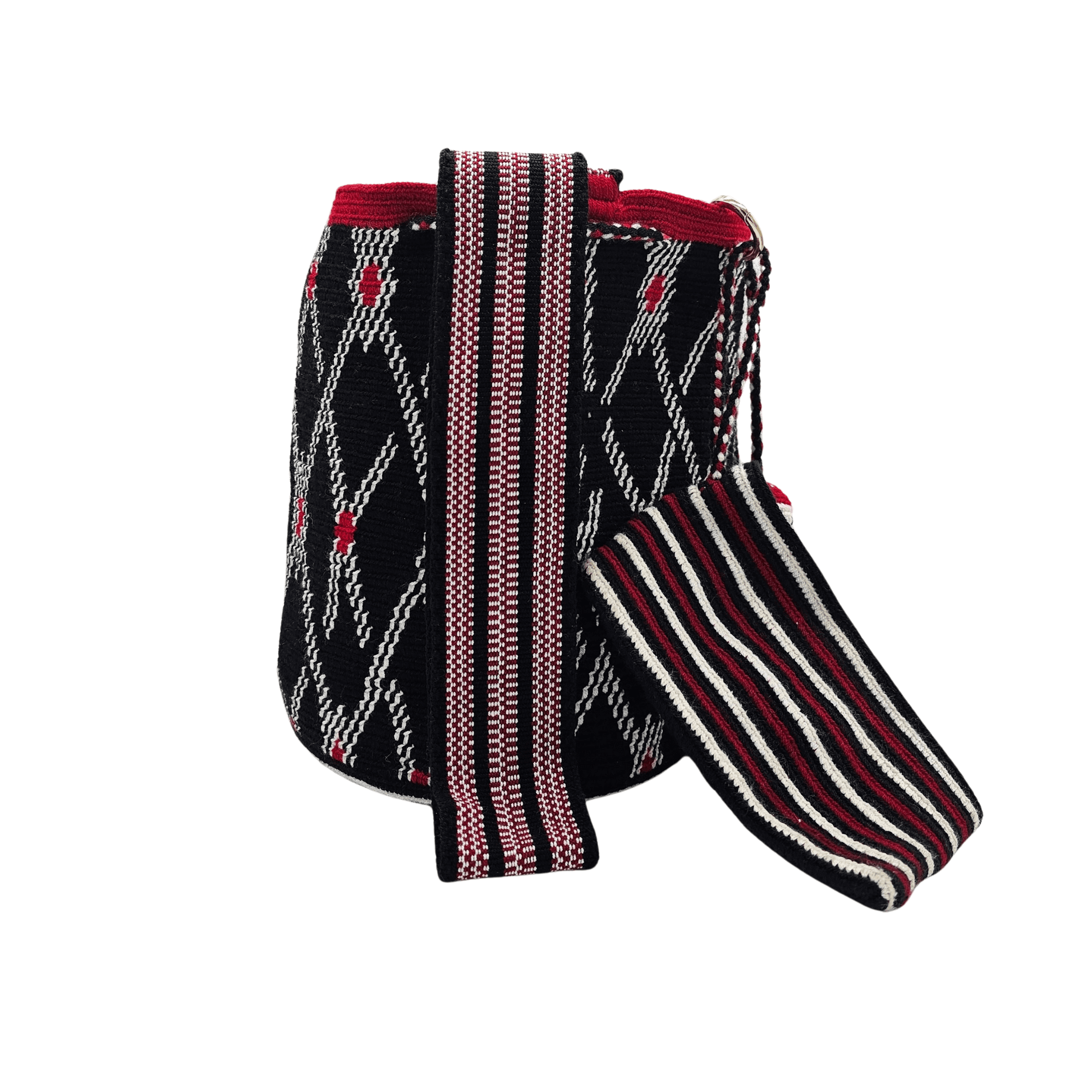 A handmade crocheted Wayuu bucket bag from Colombia. It features a bold geometric design and a long strap for easy carrying.