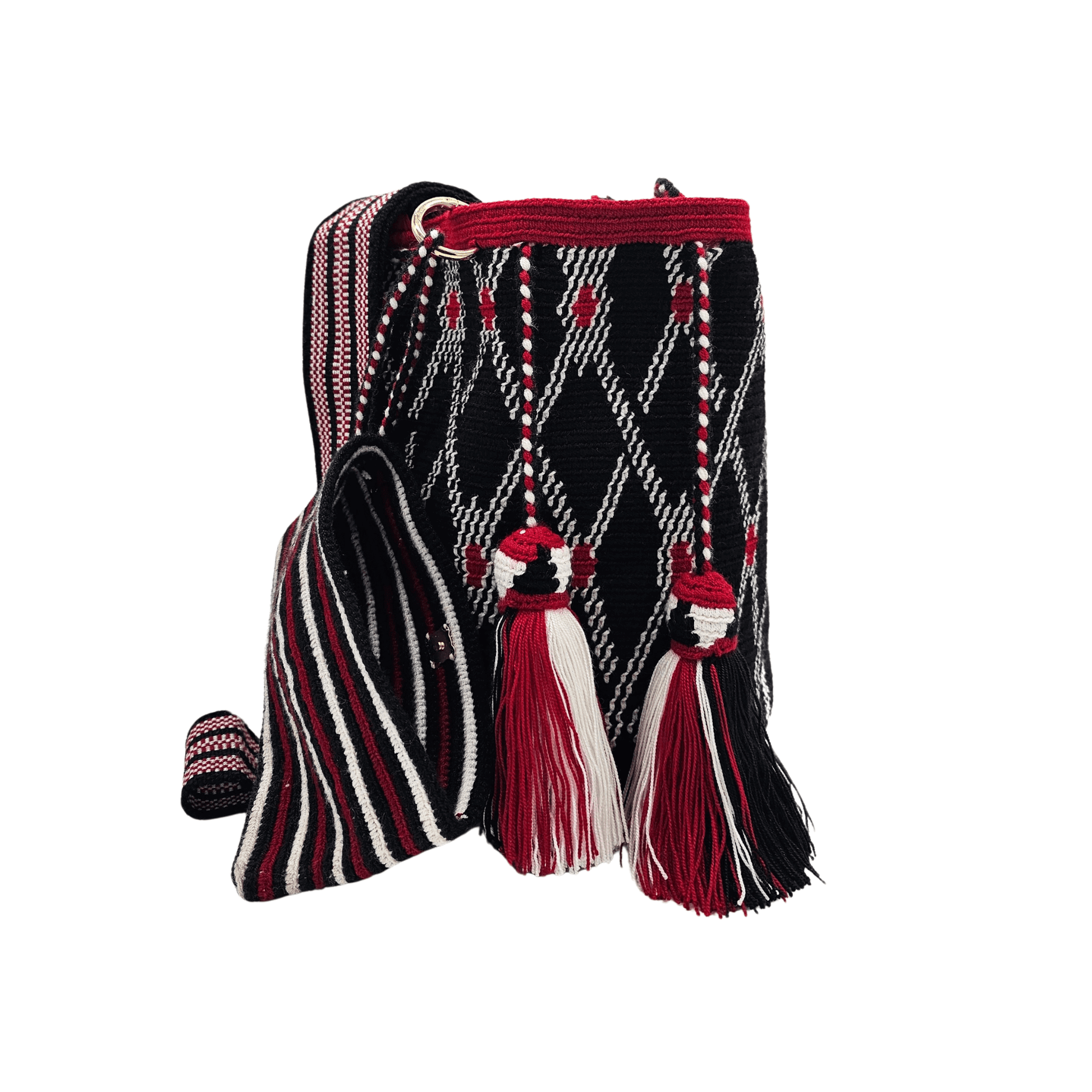 A handmade crocheted Wayuu bucket bag from Colombia. It features a bold geometric design and a long strap for easy carrying.
