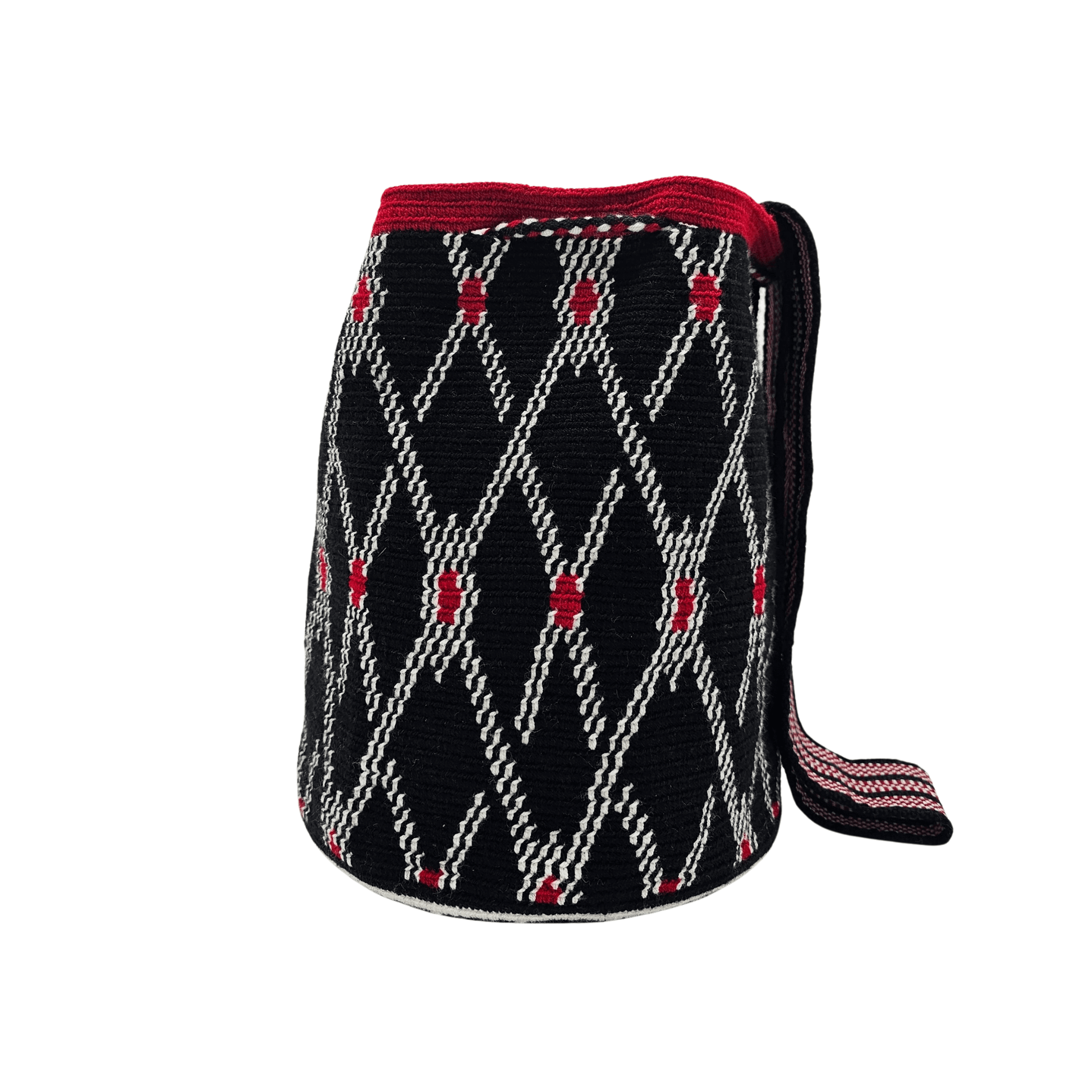 A handmade crocheted Wayuu bucket bag from Colombia. It features a bold geometric design and a long strap for easy carrying.
