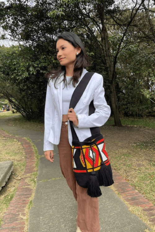 Handmade Wayuu bag by Wayuu artisans, this unique bag in black, orange and honey with a pre-Columbian geometric design is perfect for everyday use.