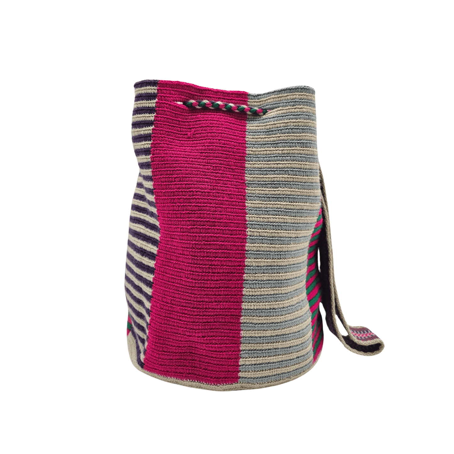 A Wayuu Mochila bag with a pink, purple, and beige striped pattern. It has a drawstring closure with tassels and includes a small matching pouch.