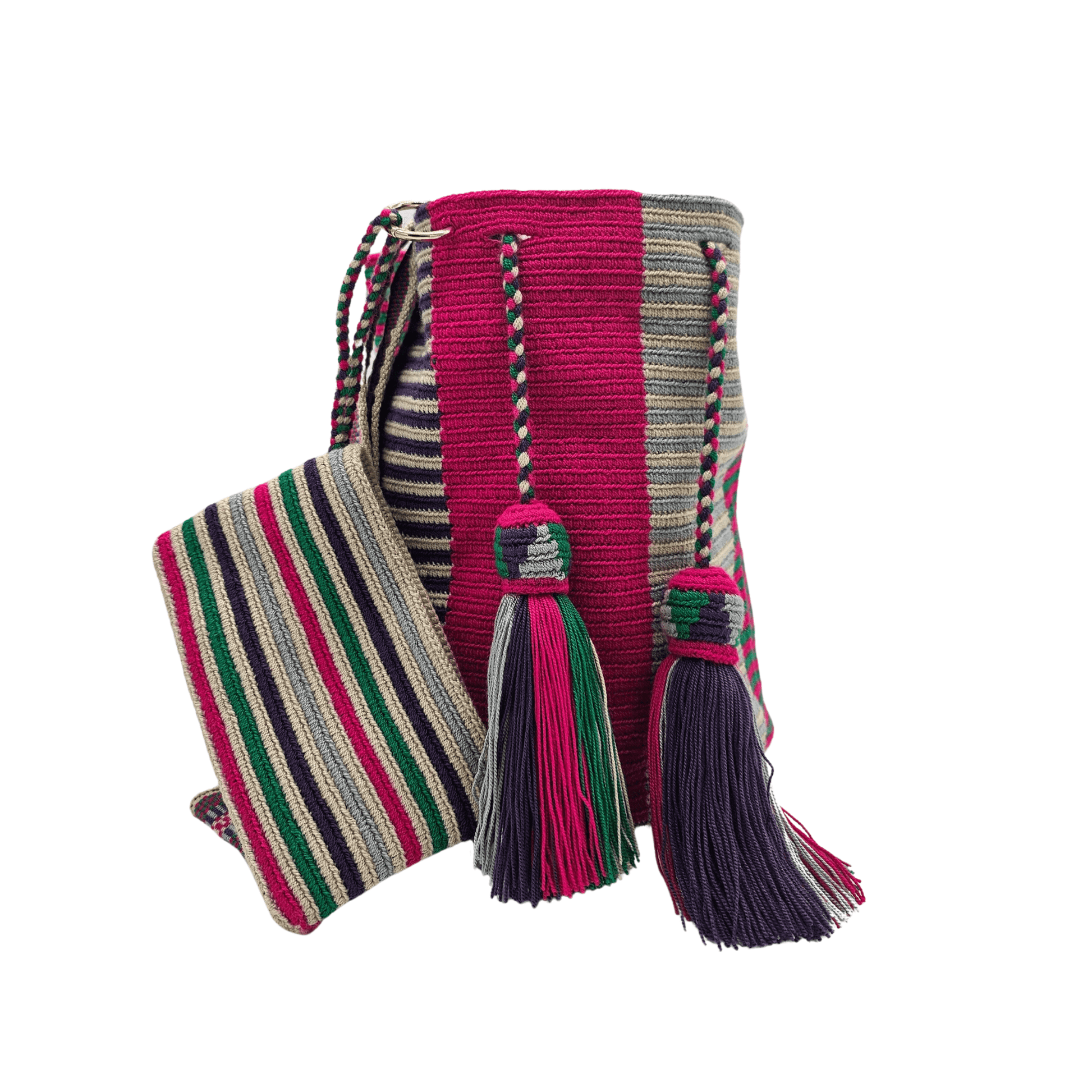 A Wayuu Mochila bag with a pink, purple, and beige striped pattern. It has a drawstring closure with tassels and includes a small matching pouch.