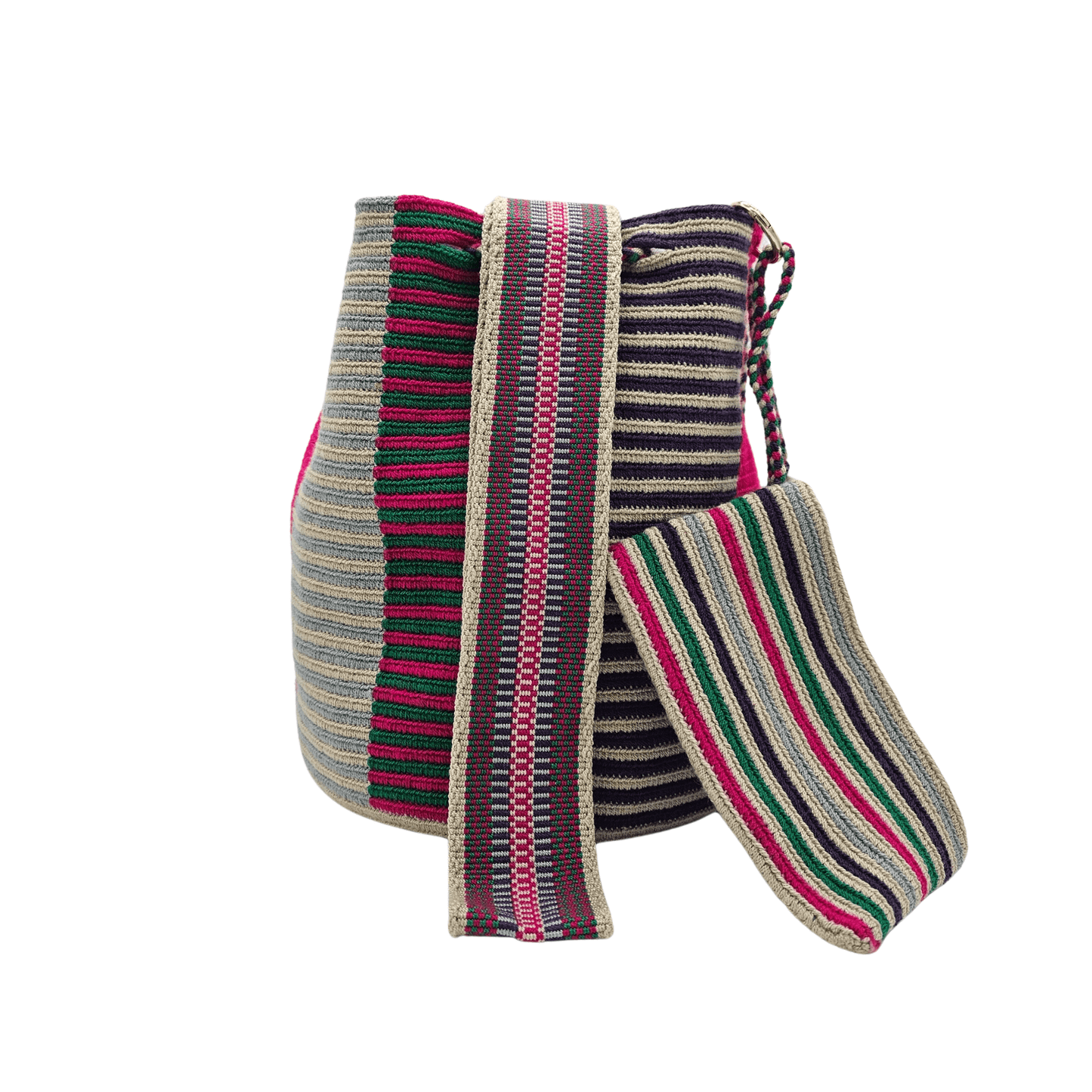 A Wayuu Mochila bag with a pink, purple, and beige striped pattern. It has a drawstring closure with tassels and includes a small matching pouch.