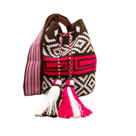  Nana Wayuu Bag, meticulously handmade by a skilled Wayuu artisan. The bag showcases a unique design in shades of white, coffee, and magenta, transforming it into a mesmerizing piece of art.