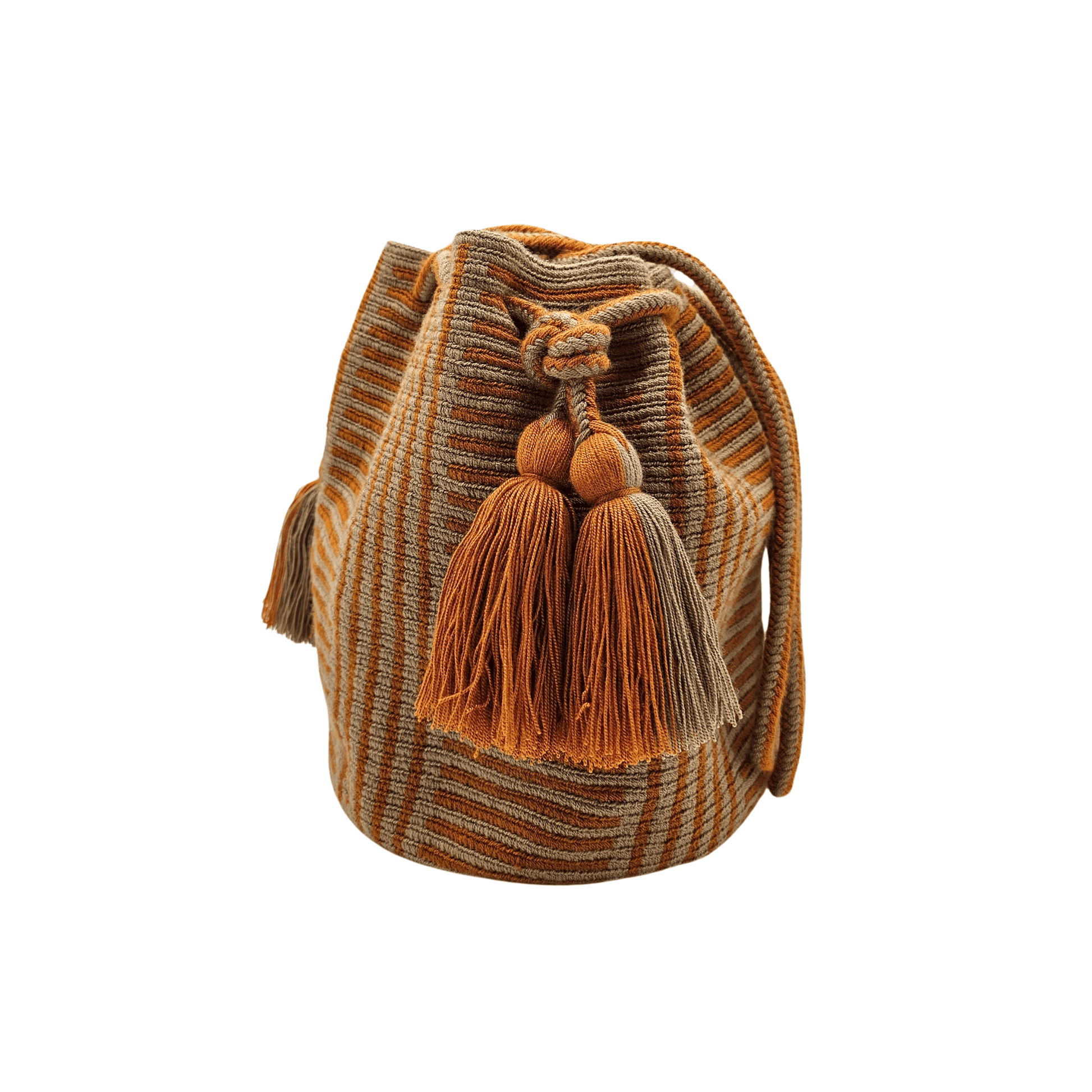A Wayuu bag with a rusty orange background and a woven geometric pattern in beige. The bag has a drawstring closure with long tassels.