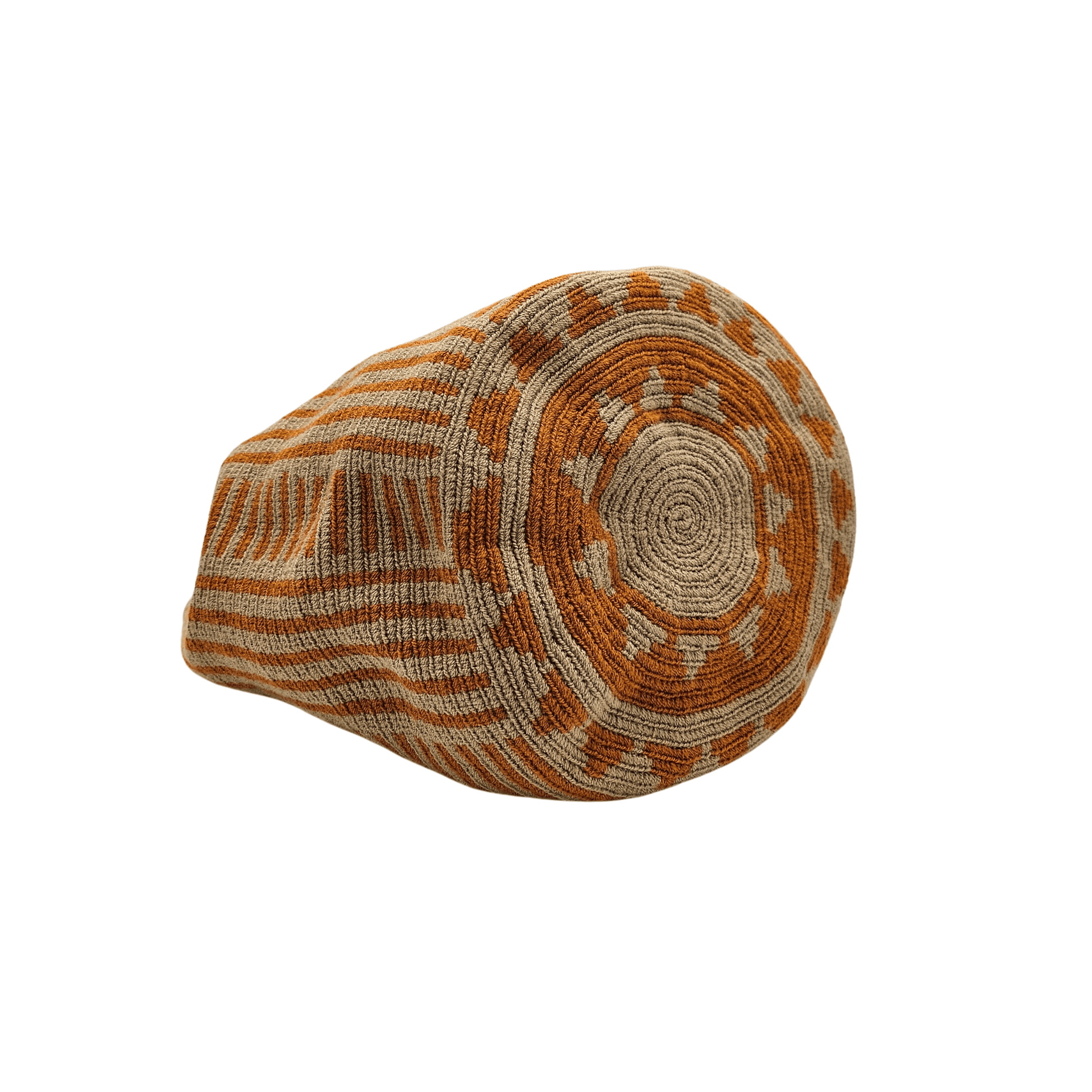 A Wayuu bag with a rusty orange background and a woven geometric pattern in beige. The bag has a drawstring closure with long tassels.