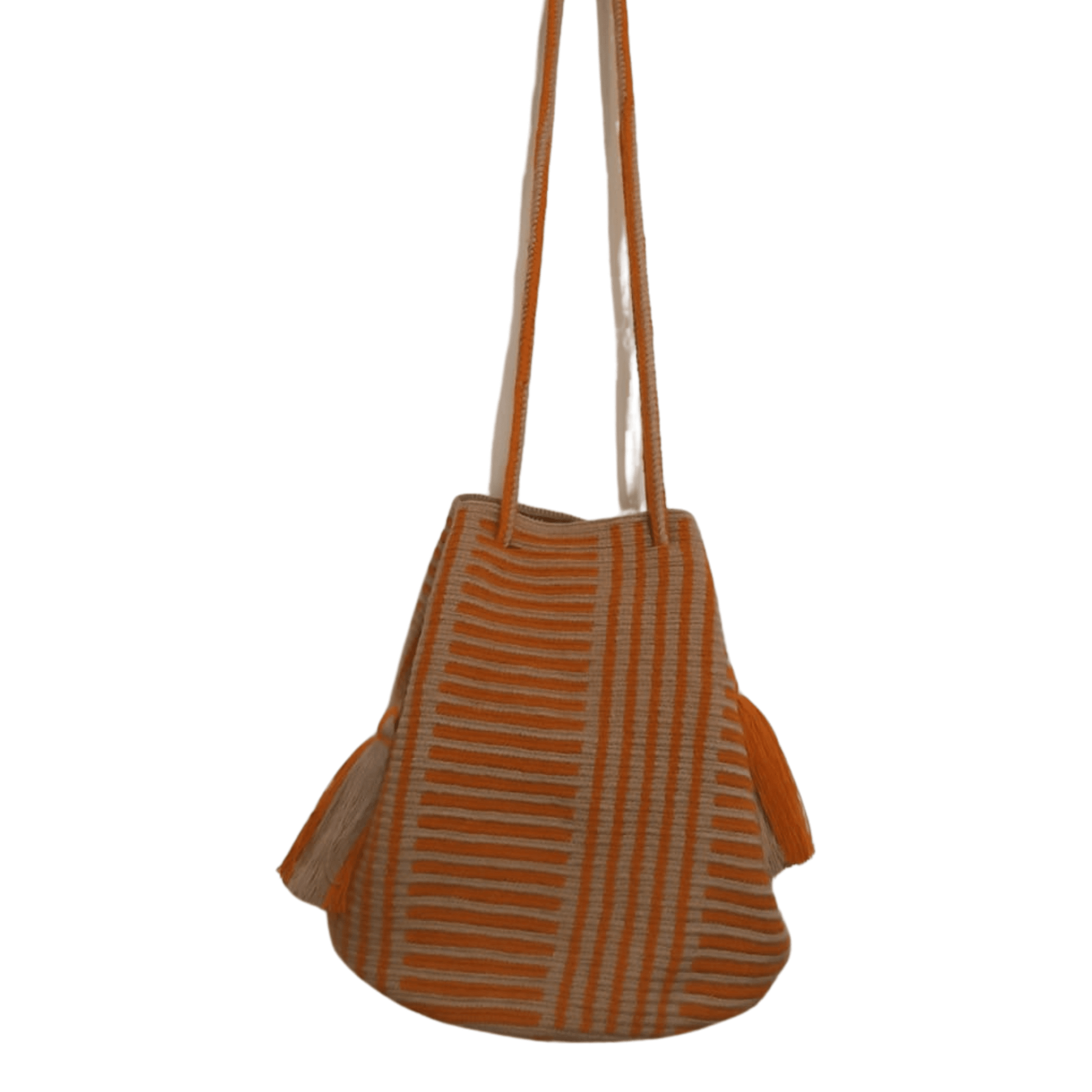 A Wayuu bag with a rusty orange background and a woven geometric pattern in beige. The bag has a drawstring closure with long tassels.