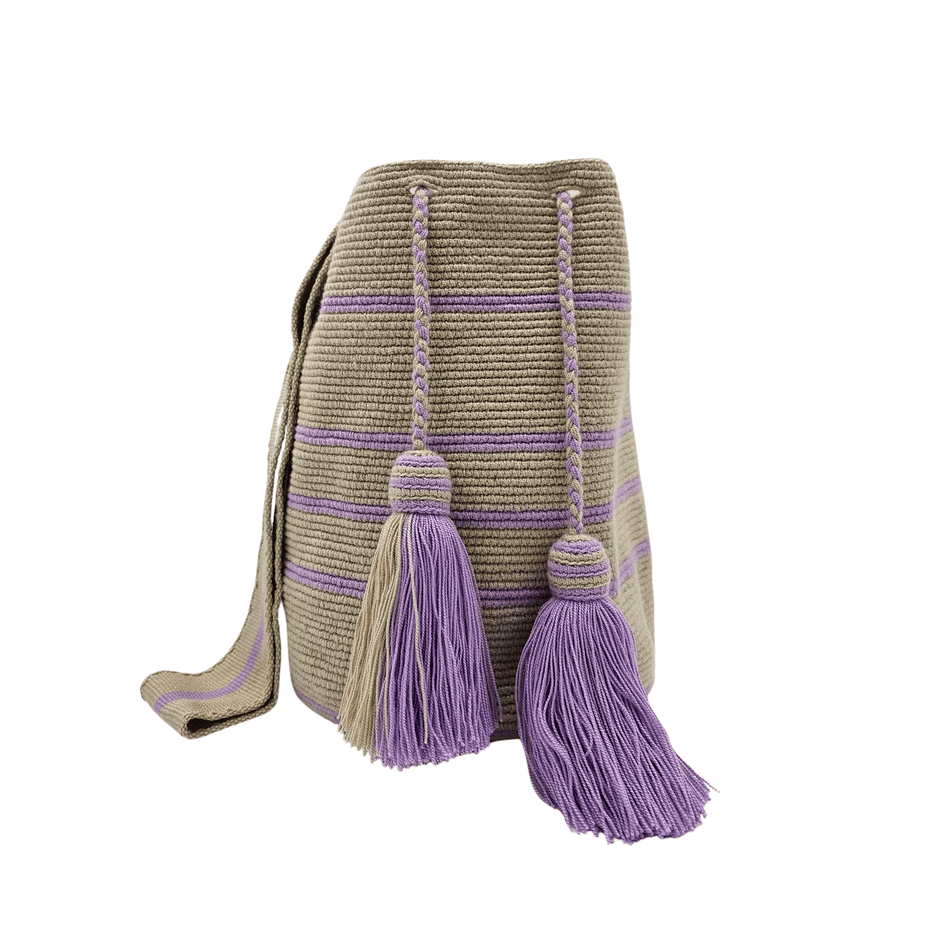 Handwoven Wayuu bag in beige with delicate lavender stripes, featuring a braided shoulder strap and decorative tassels. Ethically crafted by Colombian artisans using traditional crochet techniques.