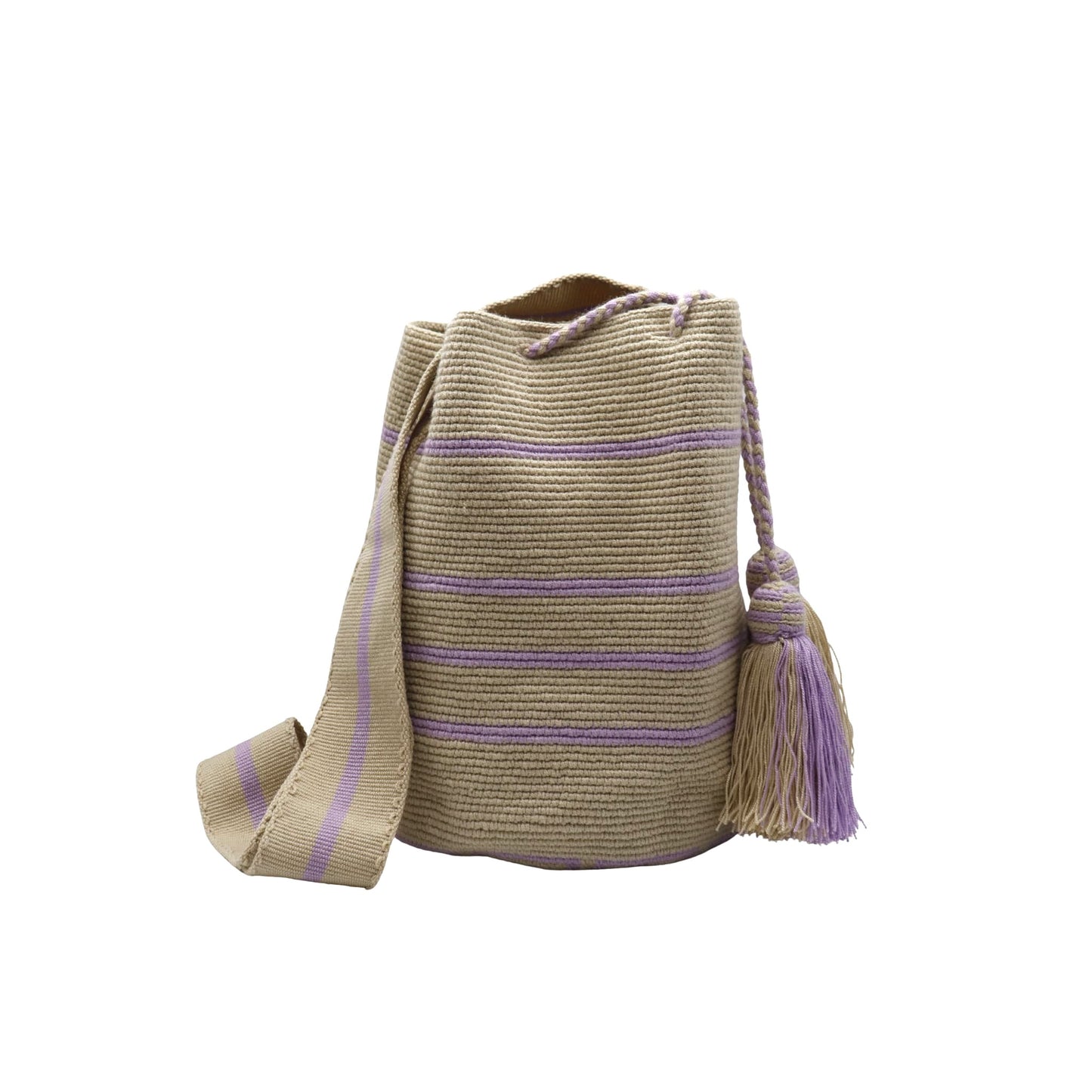 Handwoven Wayuu bag in beige with delicate lavender stripes, featuring a braided shoulder strap and decorative tassels. Ethically crafted by Colombian artisans using traditional crochet techniques.