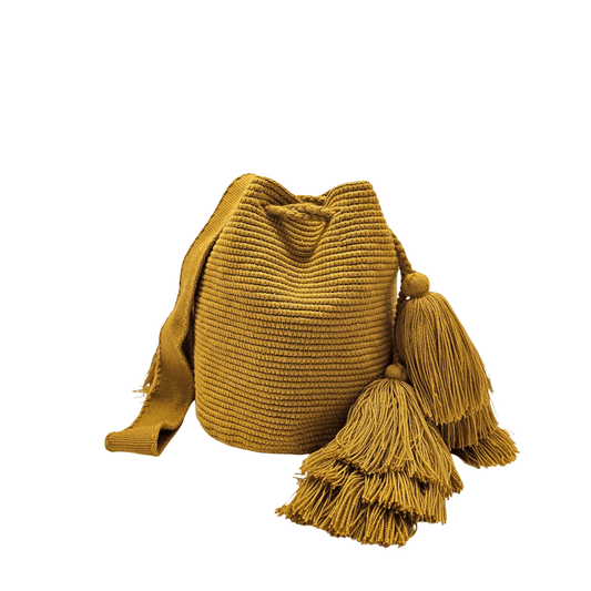 Medium Wayuu bag in honey color with stunning tassels and drawstring closure, perfect for everyday use.