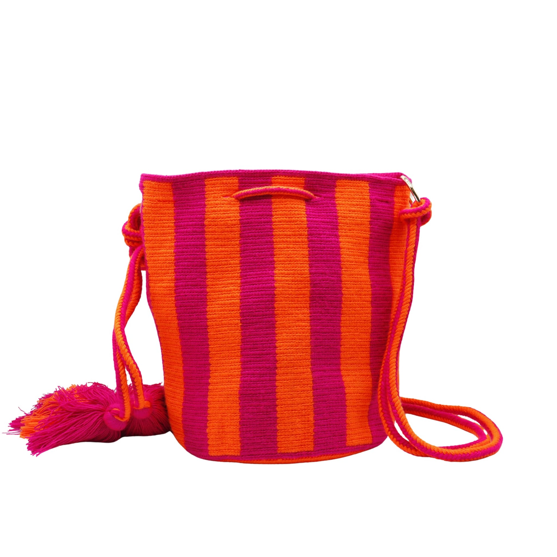 Handmade Wayuu bag with vibrant pink and orange stripes, long woven cord strap, and tassel detail.