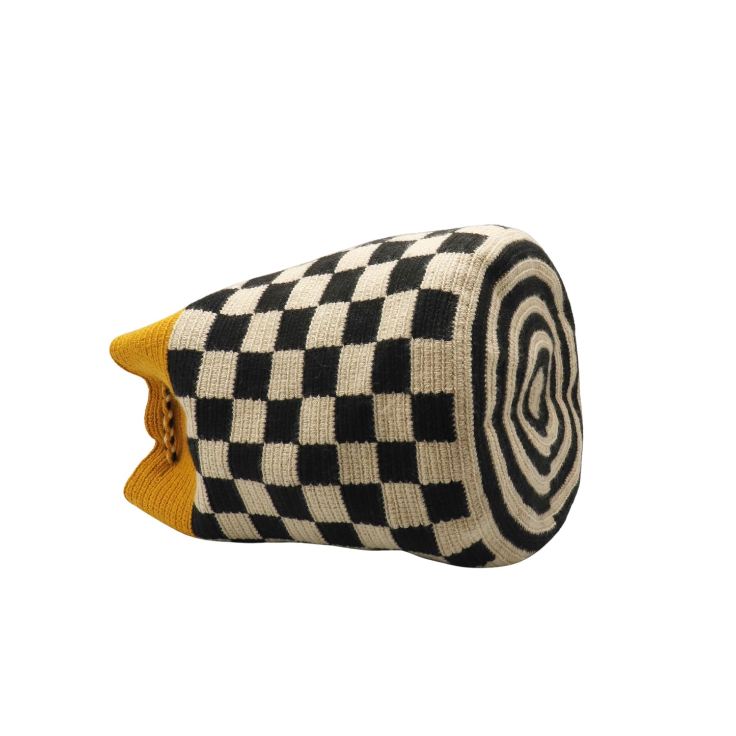 Handmade Wayuu bag with mustard, beige, and black colors, featuring a checkerboard pattern, striped woven strap, and tassel detail.